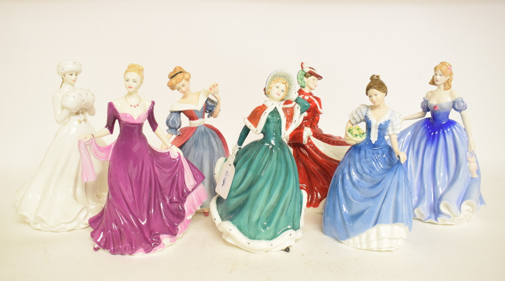 Seven Royal Doulton figures, including Christmas Day 2001, HN4315, a Royal Worcester figure,