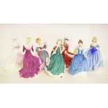 Seven Royal Doulton figures, including Christmas Day 2001, HN4315, a Royal Worcester figure,