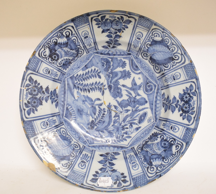 A Delft plate, decorated chickens, flowers and foliage, chipped and cracked, 34 cm diameter, - Image 3 of 3