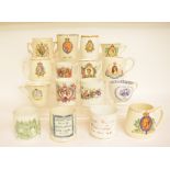 Assorted commemorative mugs, a cranberry and clear glass vase and cover, a motto ware jar,