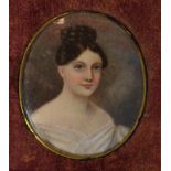 An oval bust portrait miniature, of a la