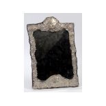 A Victorian embossed silver strut mirror