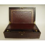 A rosewood writing slope, with brass inl