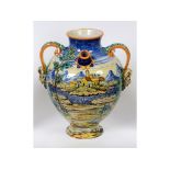 A maiolica drug jar, decorated figures i