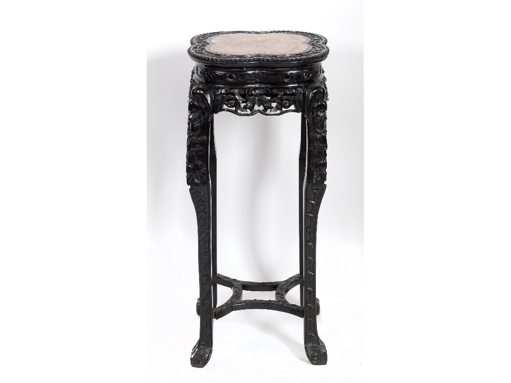 A Chinese carved hardwood jardiniere sta