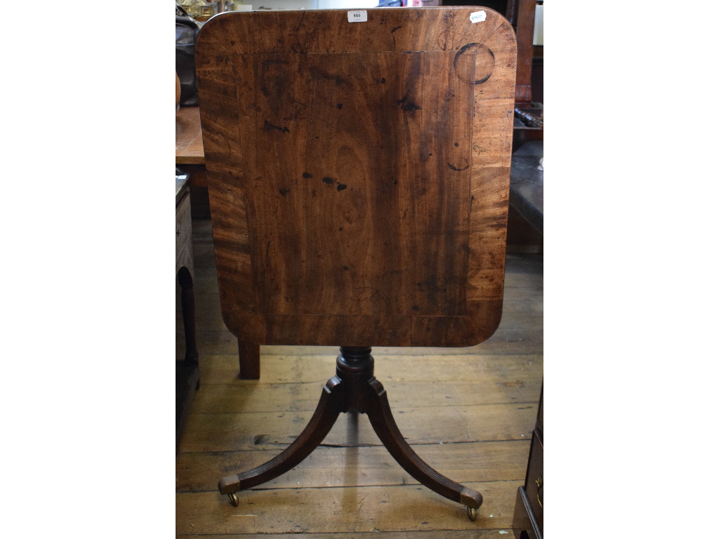 A 19th century mahogany tripod table, 77