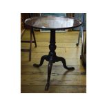 A 19th century mahogany tripod table, on