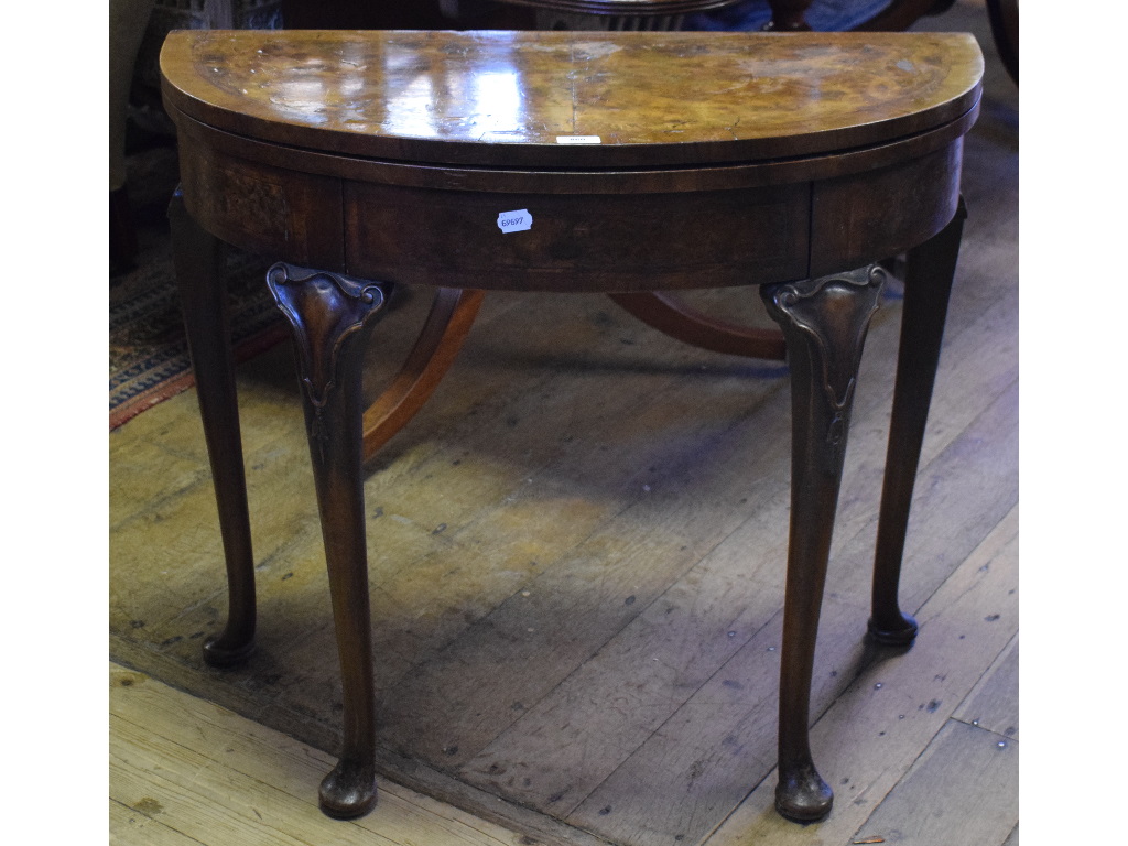 An 18th century style D shape card table