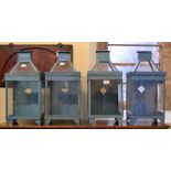 A set of four tole ware wall lanterns, o