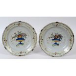 A pair of Delft chargers, decorated flow
