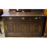 A 19th century oak sideboard, having thr