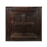 A CHARLES II OAK SPICE CUPBOARD