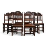 EIGHT CLOSELY SIMILAR JOINED CHAIRS MADE IN OAK