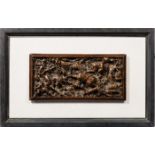 AN ITALIAN CARVED WALNUT RELIEF PANEL