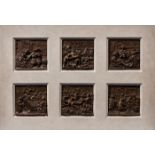 A SET OF SIX CARVED OAK PANELS, LOW COUNTRIES