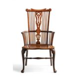 A CHERRY, WALNUT AND ELM WINDSOR ARMCHAIR