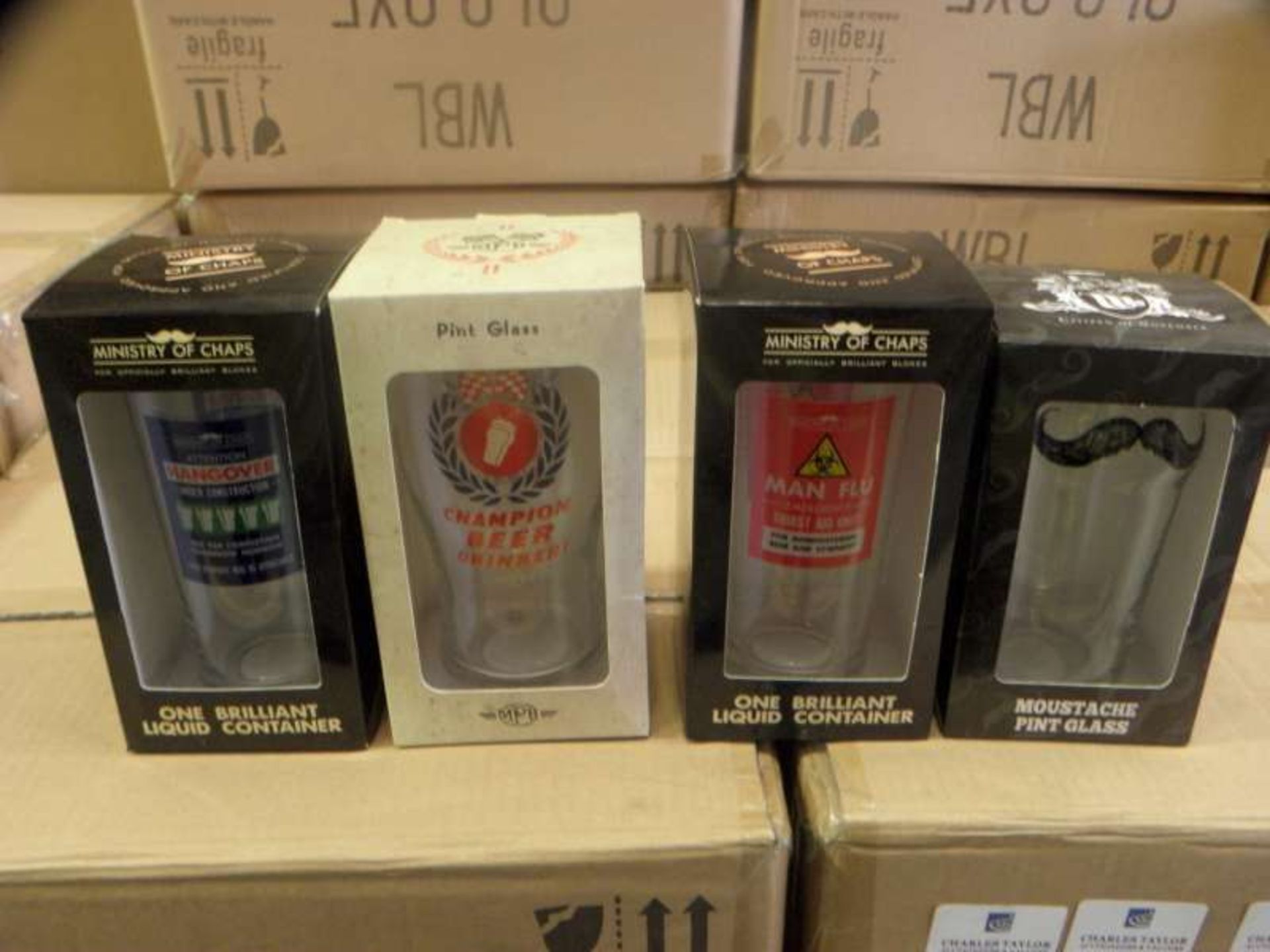 144 X VARIOUS NOVELTY PINT GLASSES IN 6 BOXES