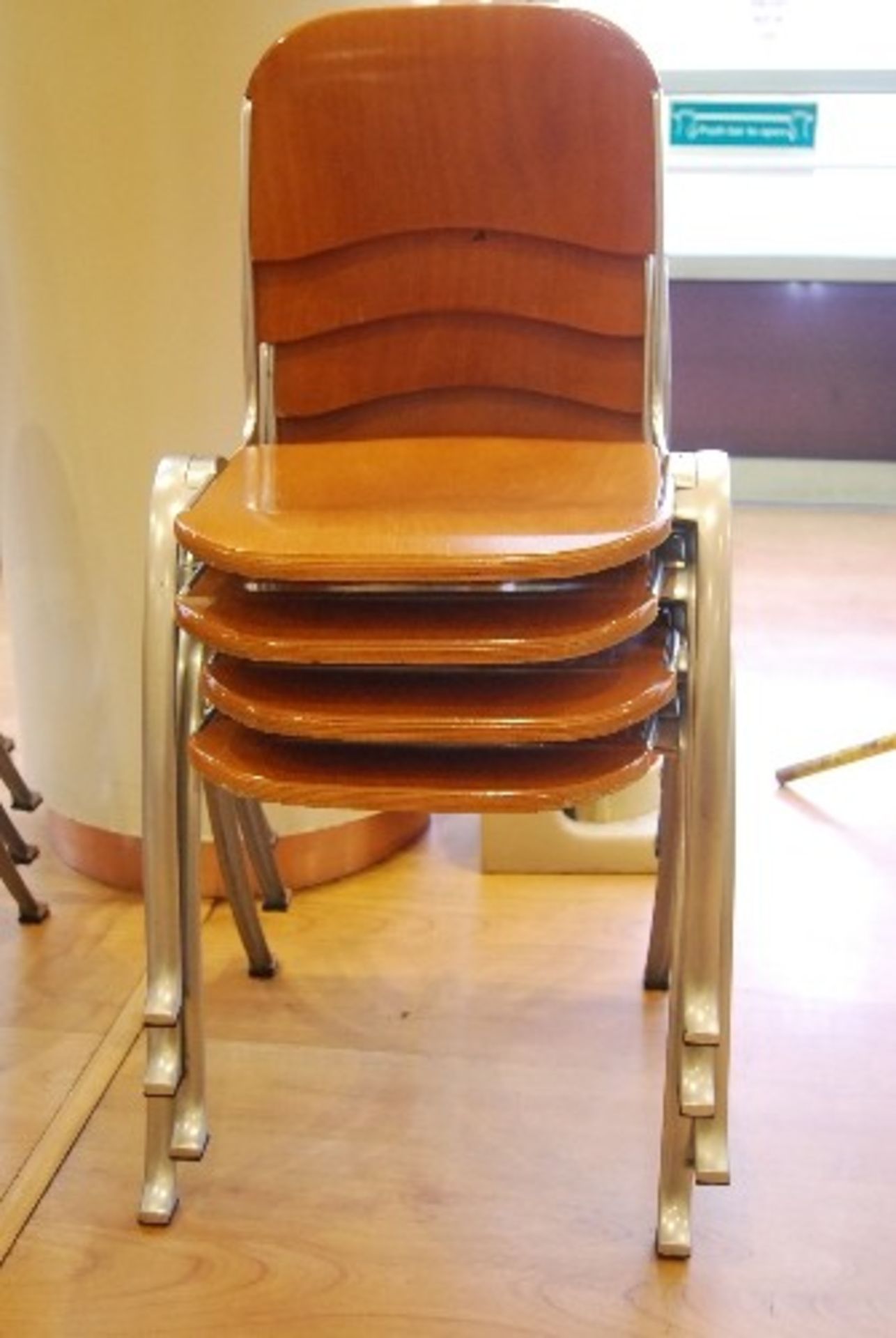 4 - Aluminium framed stacking chairs with wooden seat and back