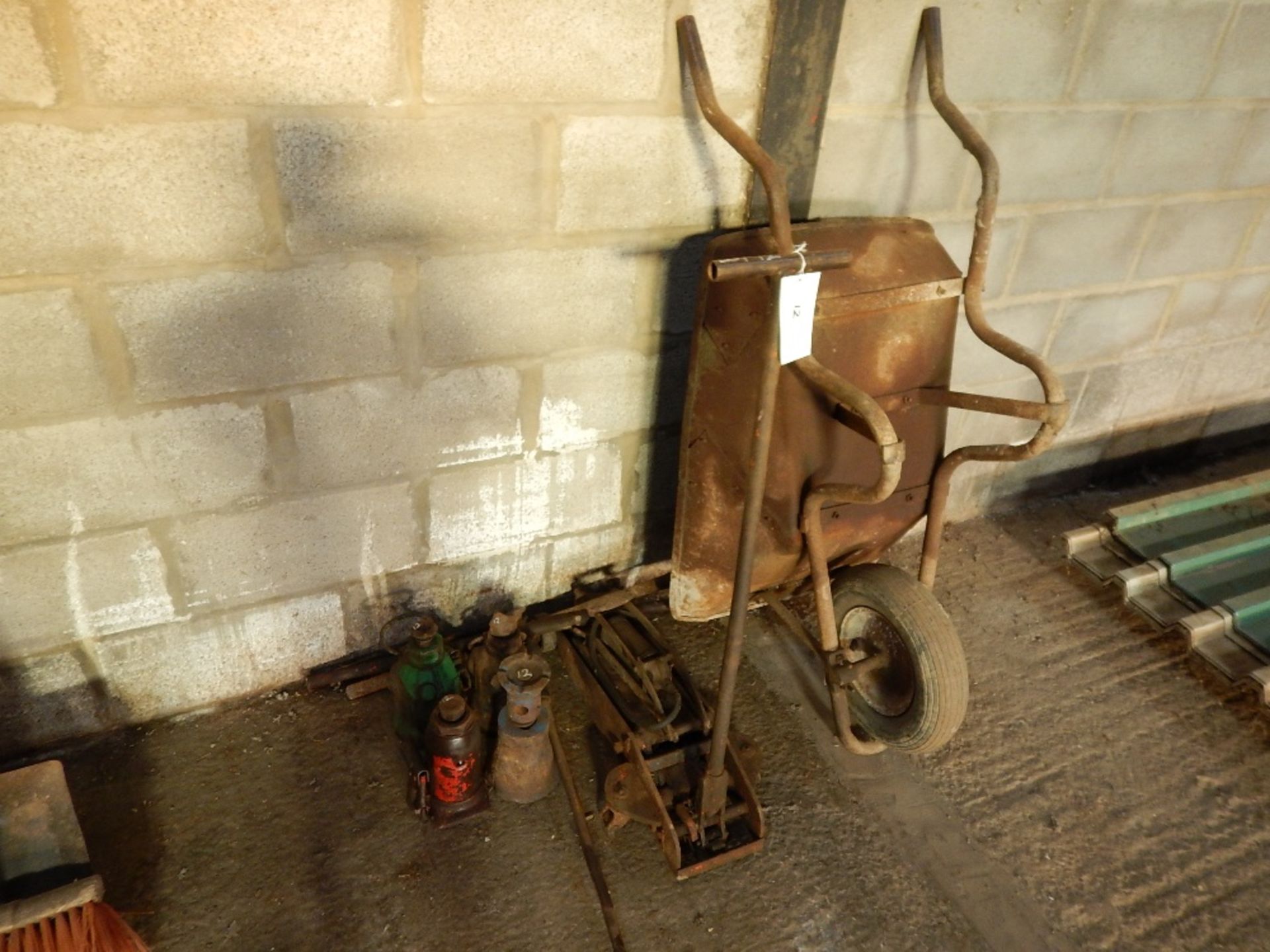 4no. bottle jacks, trolley jack, foot pump and metal wheelbarrow