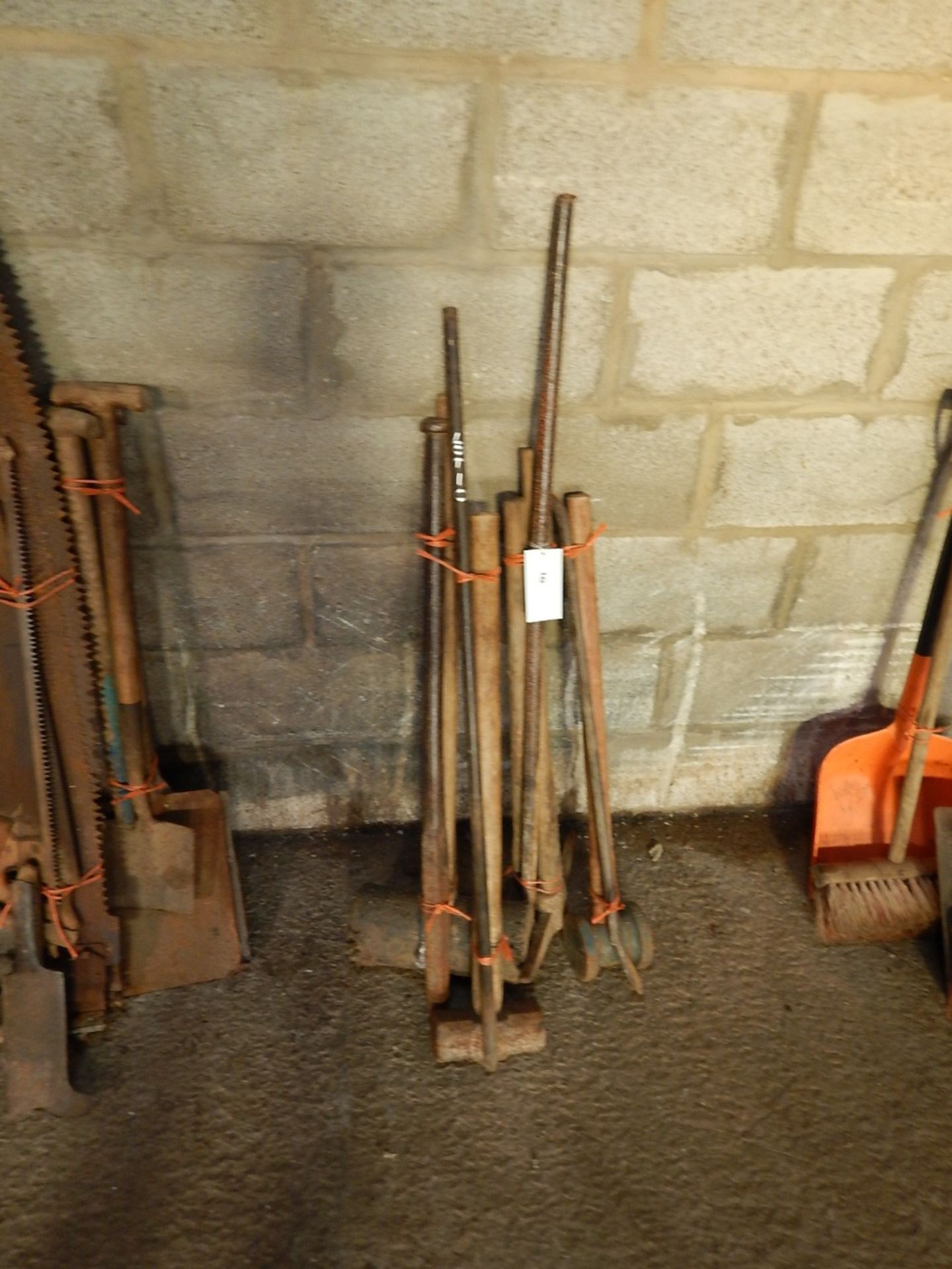 Qty sledge hammers, pick axes and bars etc