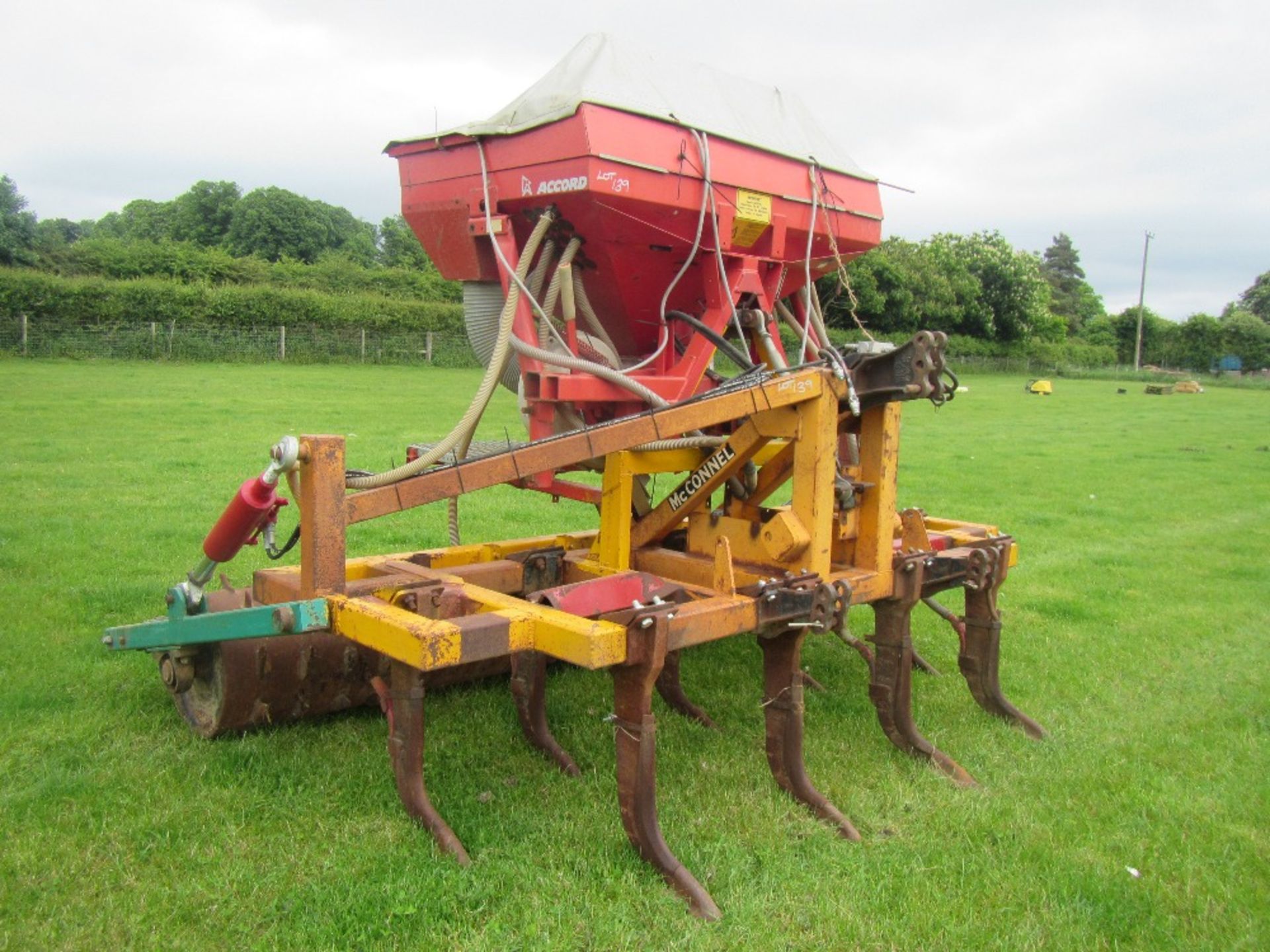 McConnel Shakaerator 9leg cultivator with hydraulic packer roller and Accord bean hopper/drill