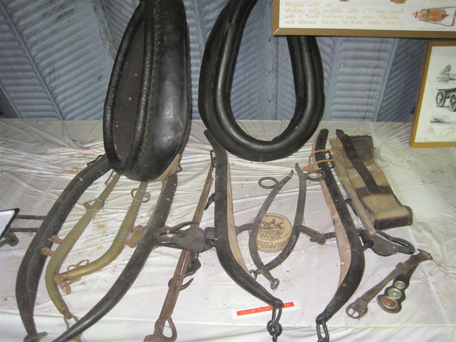 2no. leather horse collars and 3no. prs of harness etc