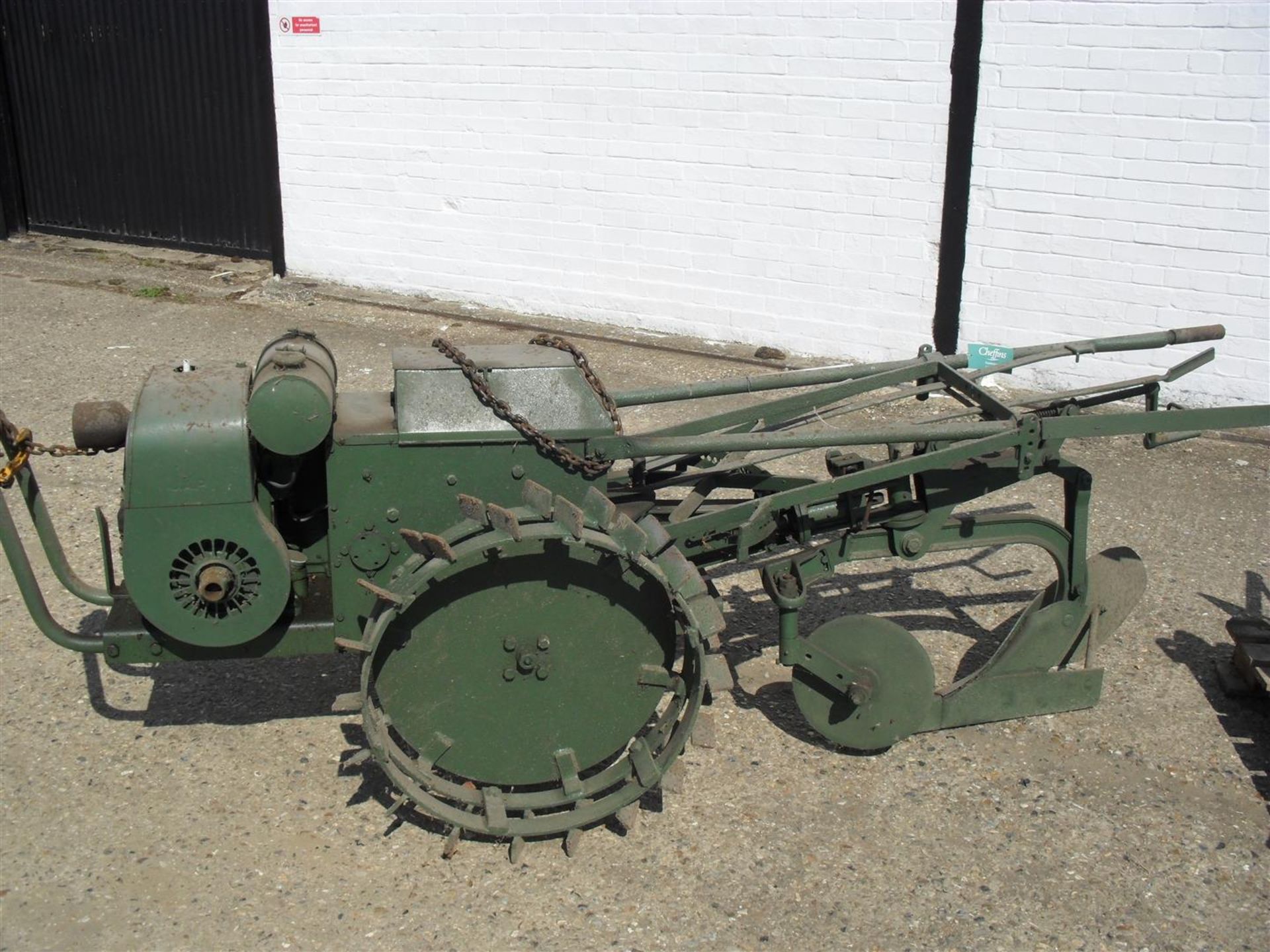 Trusty Tractor motor cultivator with JAP engine fitted with single furrow plough body & potato