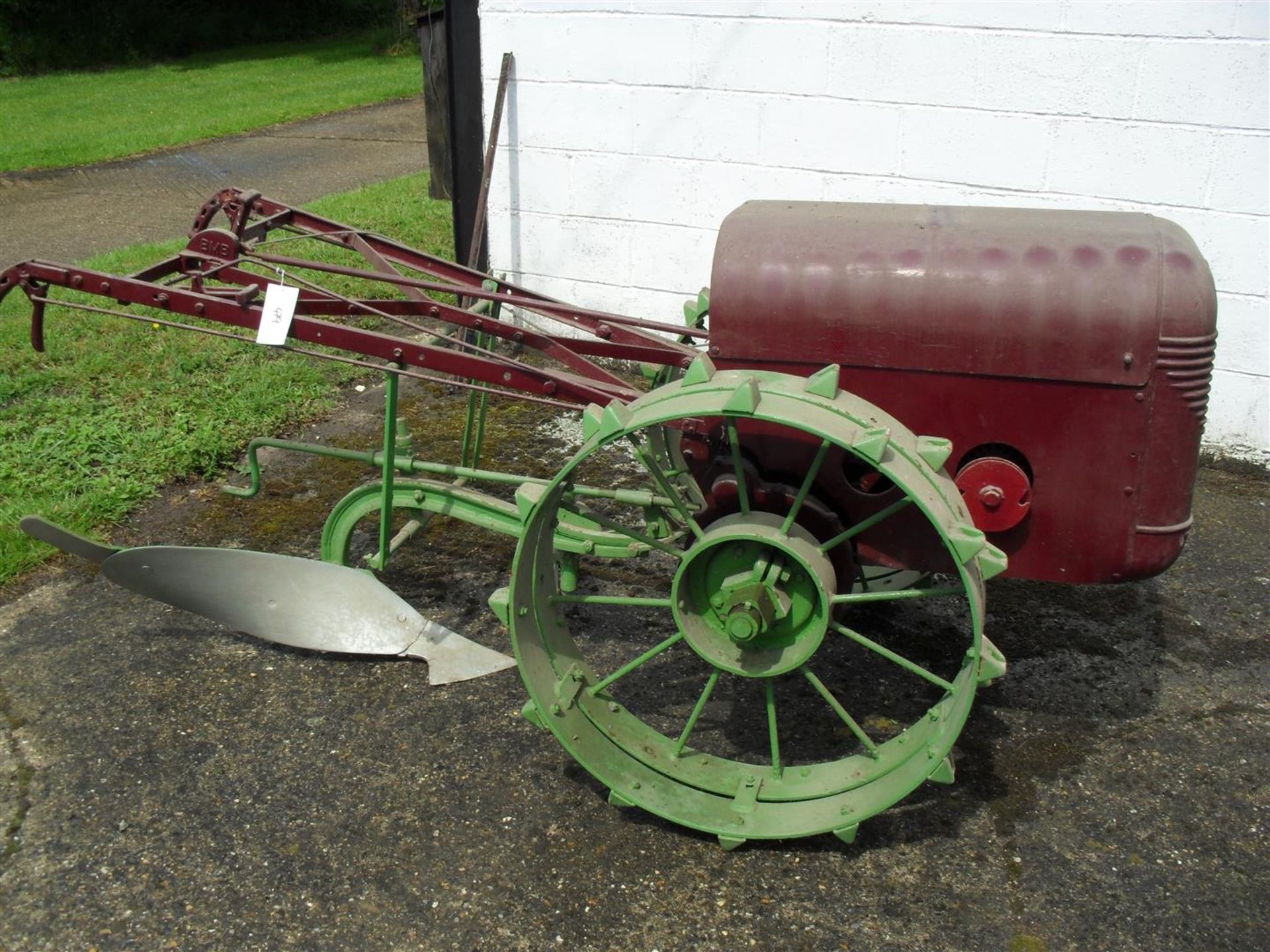 BMB Plowmate motor cultivator fitted with single furrow plough body