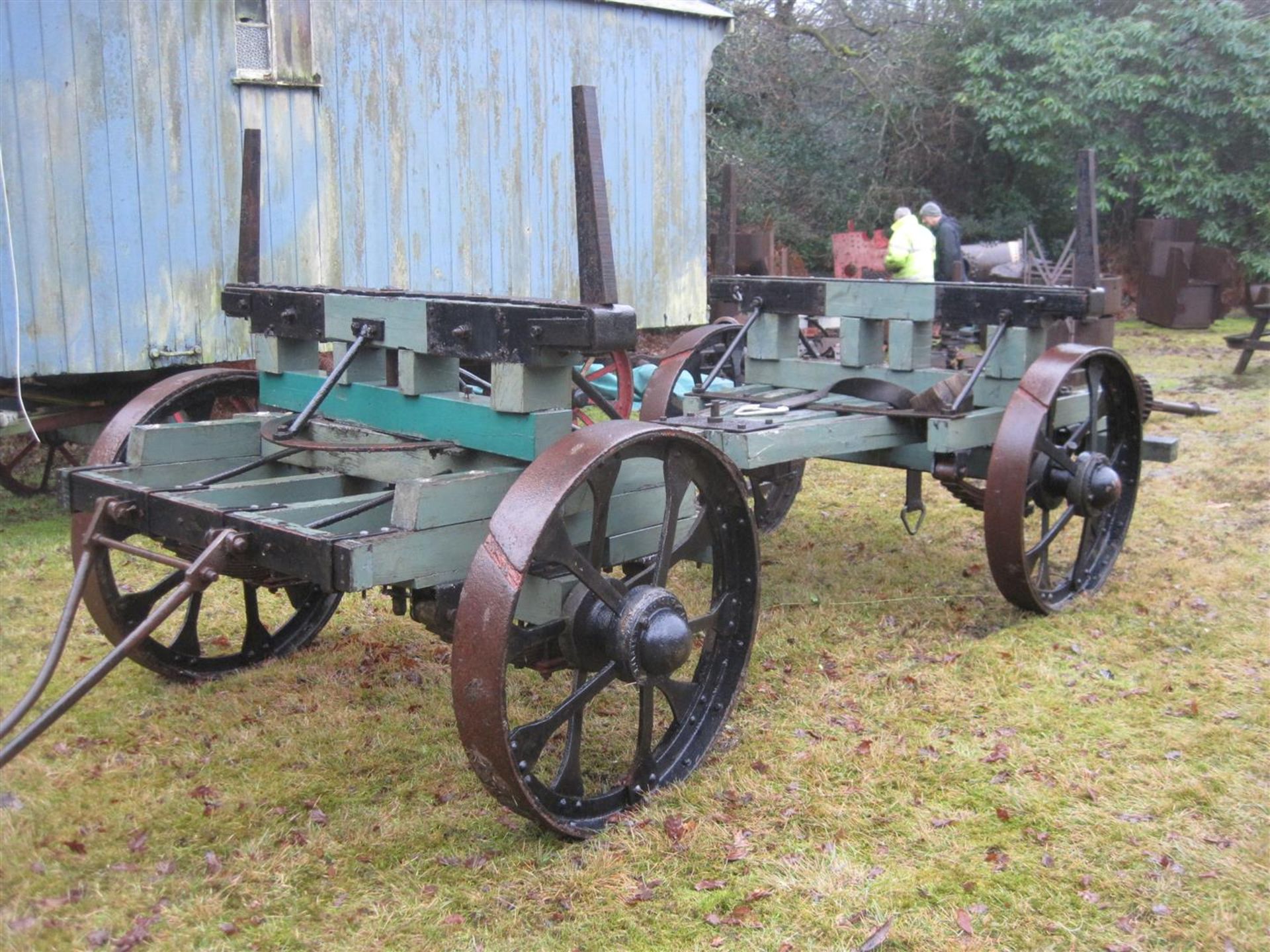 Taskers of Andover pole trailer, fully sprung on solid rim riveted spoked wheels, an older