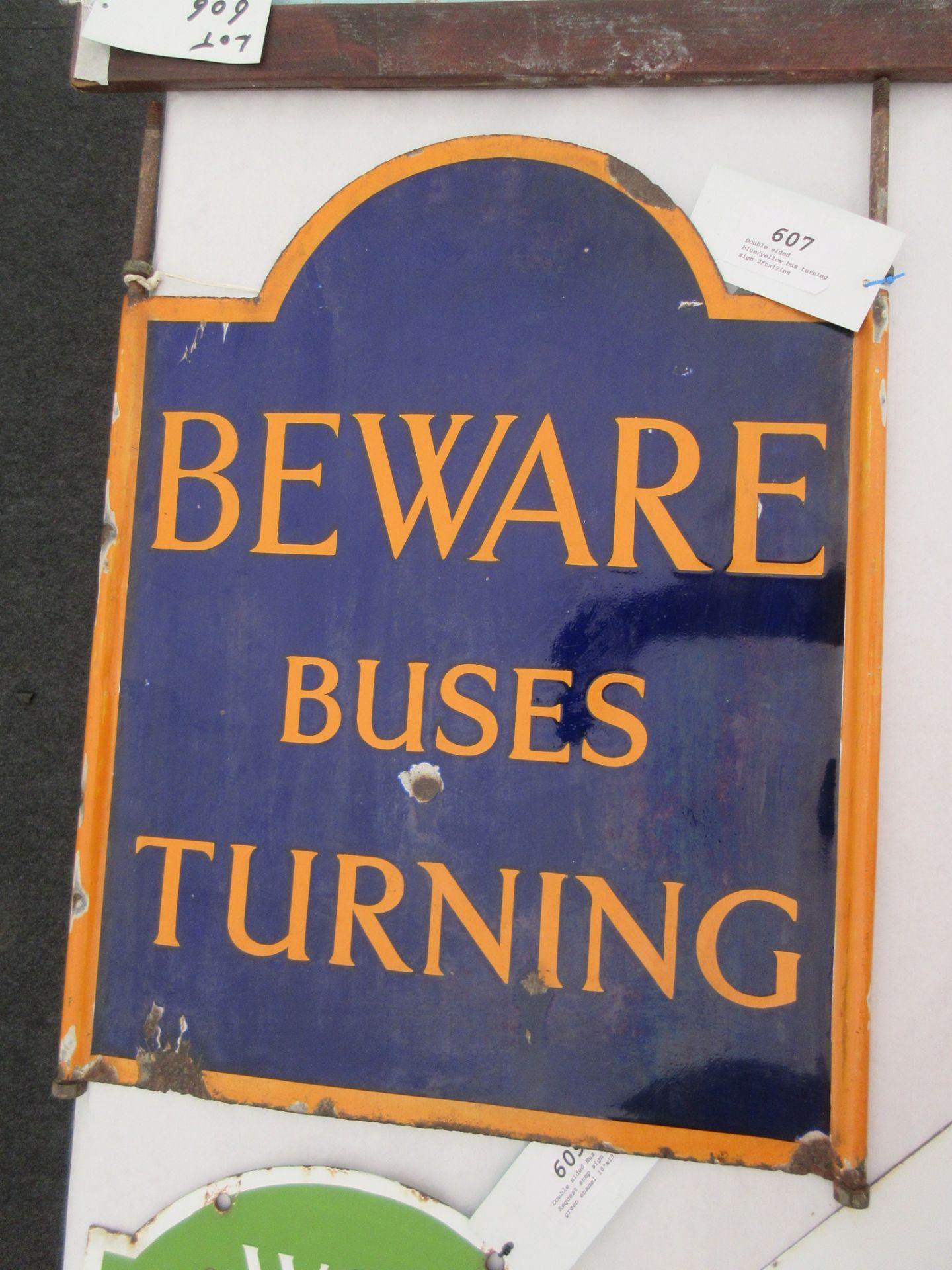 Double sided blue/yellow bus turning sign 2ftx19ins