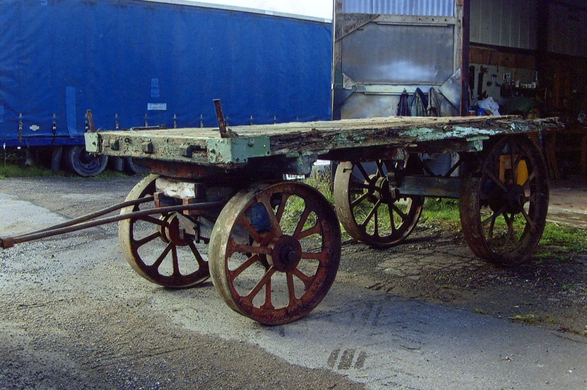 Circa 1900 Aveling & Porter traction wagon. In derelict condition this flatbed trailer is lacking