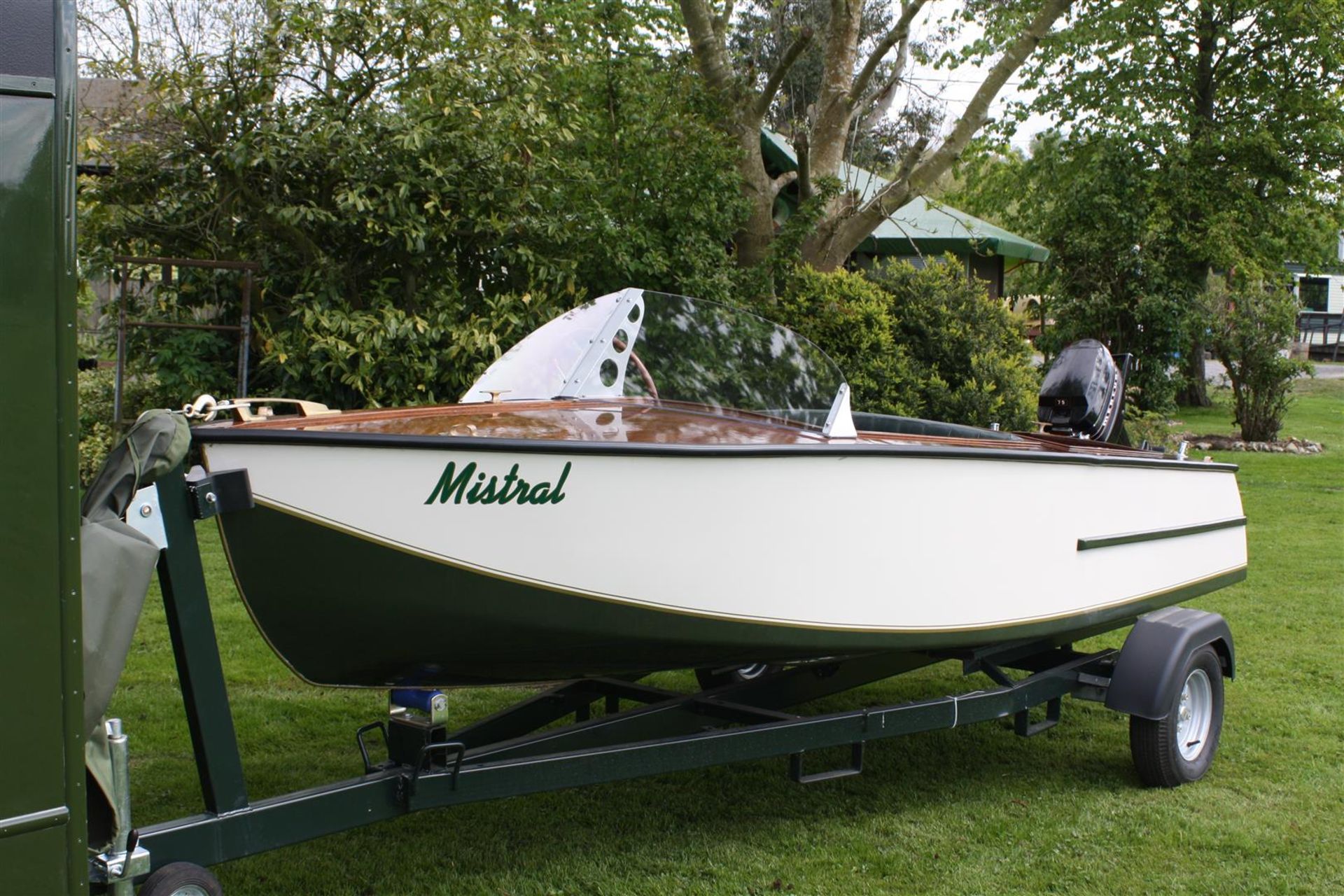 1954/5 Four seat twin cockpit river launch 'Mistral' with restored 7.5hp Mercury outboard.