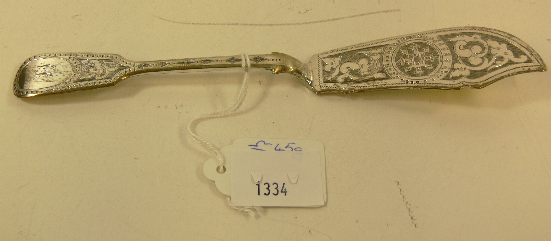 A hallmarked silver knife (approx 45g) with monogram (est £20-£40)