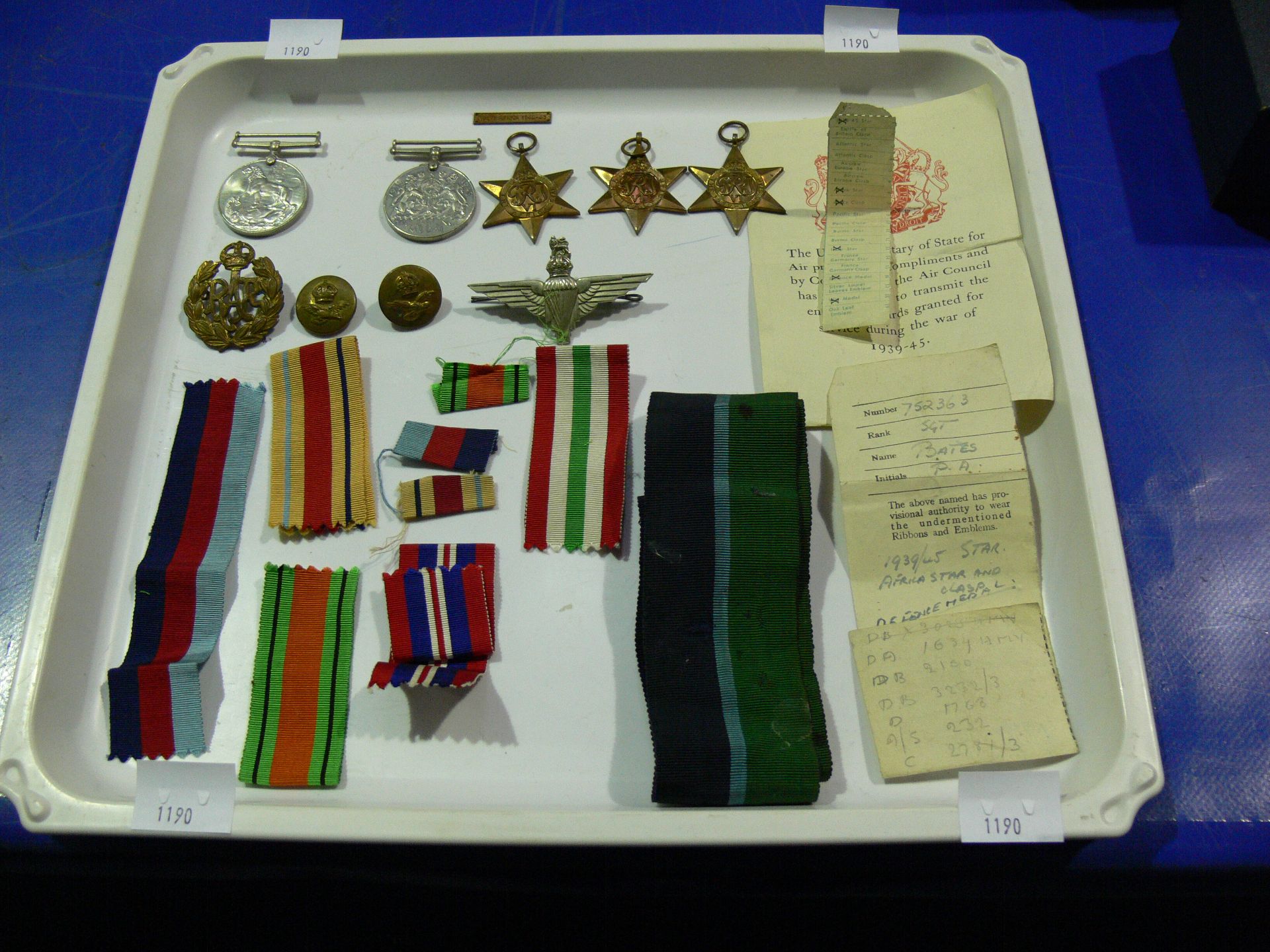 Various medals, clasp, cap badges & buttons together with associated paperwork awarded to Sgt P.