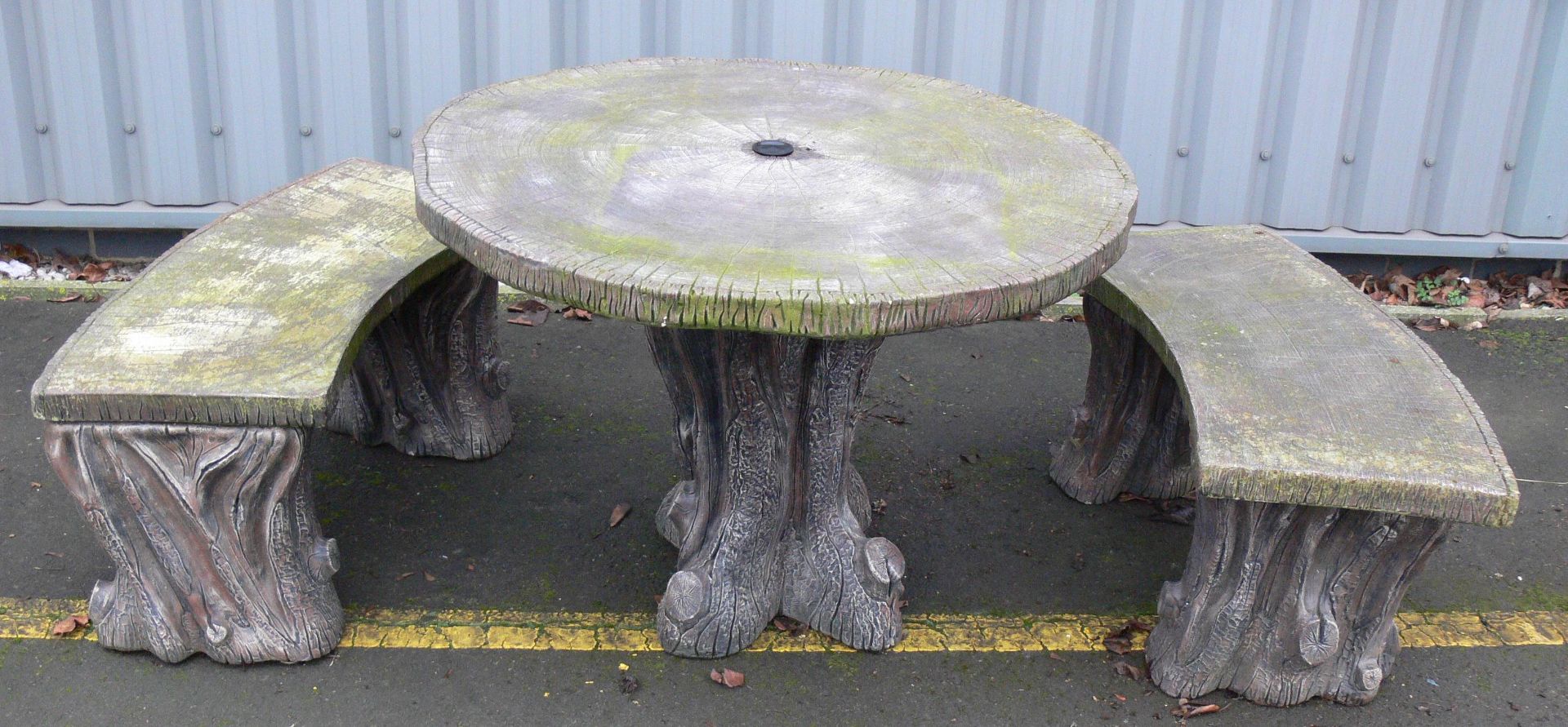 A 3 Piece outside Table and Chair Set, Wood Effect Possibly Resin. Please note there is a £10 + VAT