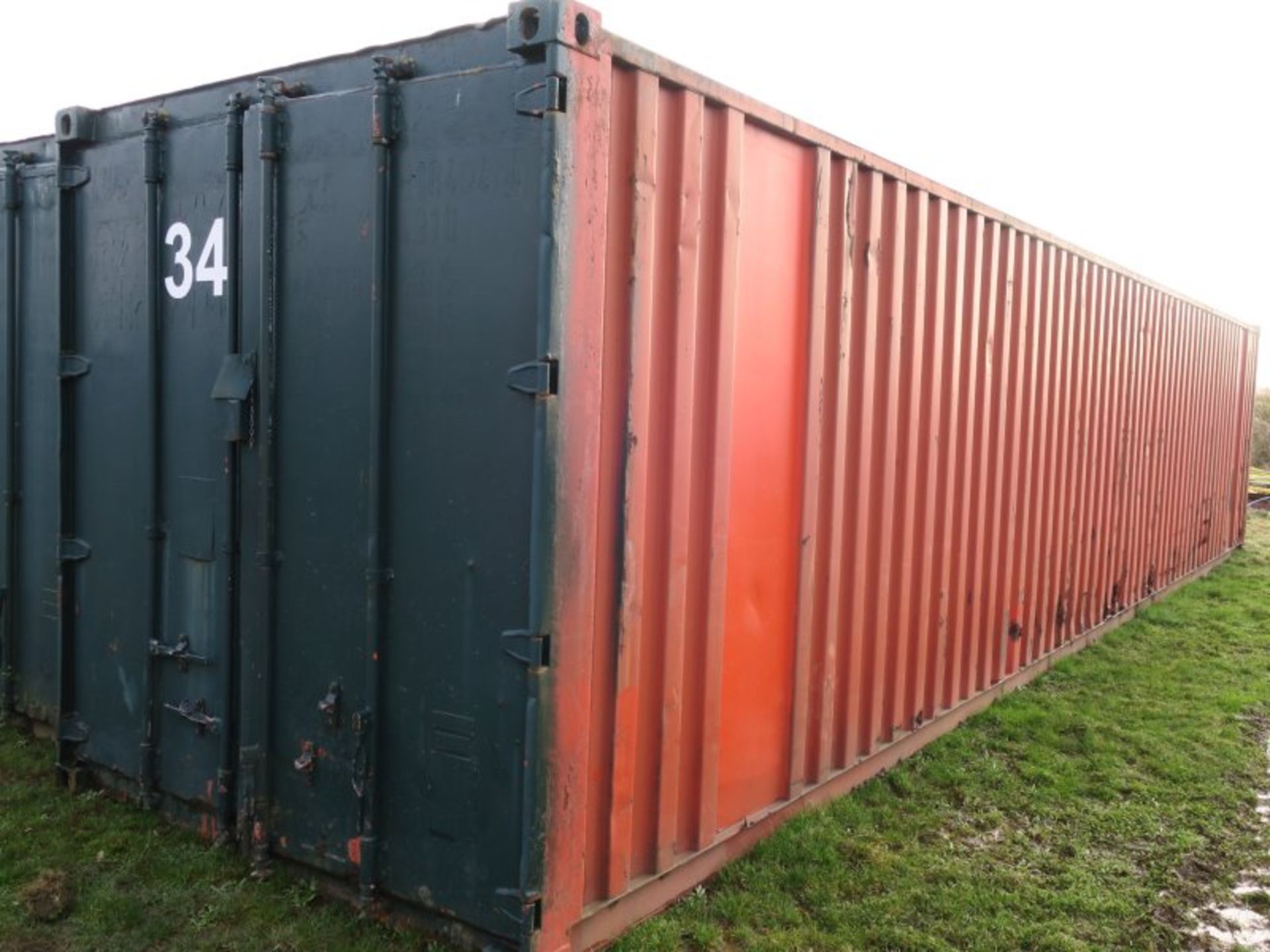 * 40' Shipping container with insulated roof (container ID 34). Sold loaded onto buyers transport.