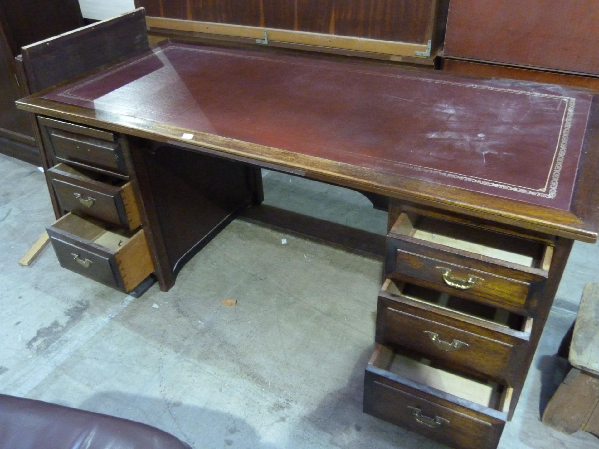 * A red leather topped twin pedestal desk with 3 drawers either side together with a 4 drawer red - Image 3 of 4