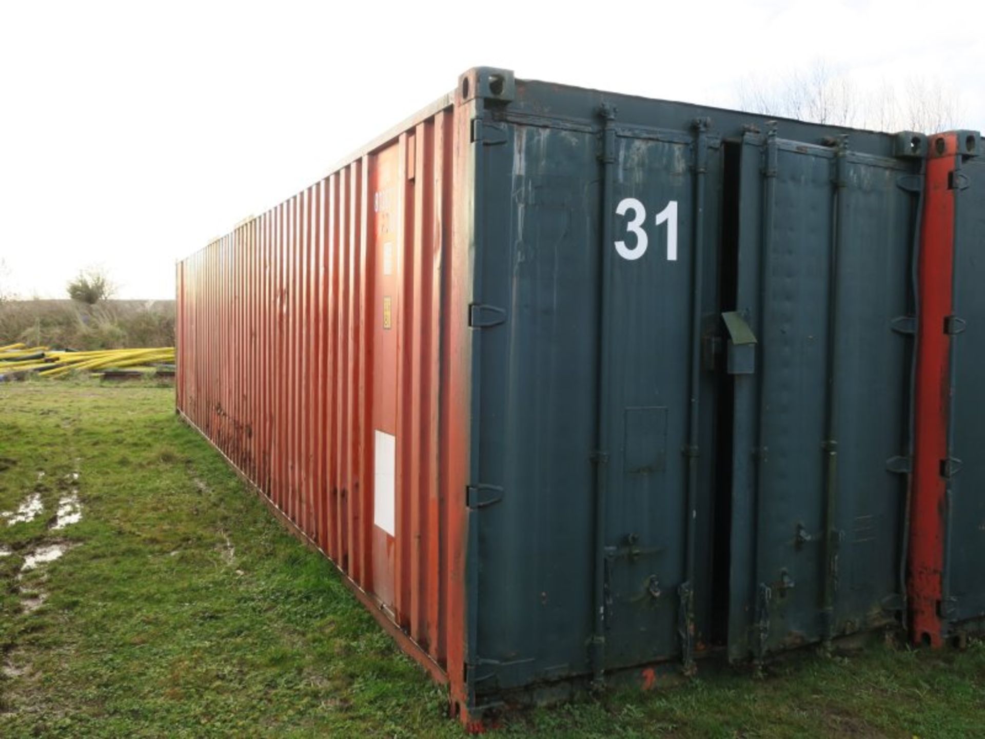 * 40' Shipping container with insulated roof (container ID 31). Sold loaded onto buyers transport.