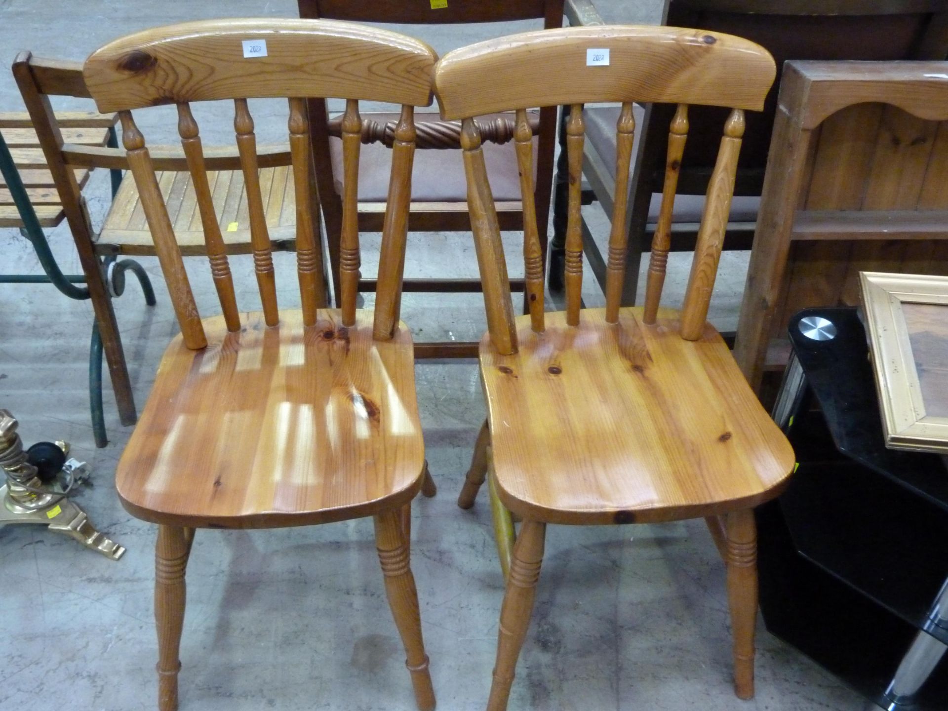 A miscellaneous lot to include two pine chairs, a hanging shelf unit H78cm, L51xm, W12cm), a black &