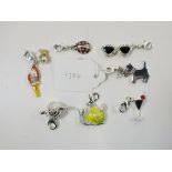 This is a Timed Online Auction on Bidspotter.co.uk, Click here to bid. Silver Charm Bracelet with 17