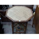 This is a Timed Online Auction on Bidspotter.co.uk, Click here to bid. A bamboo octagonal table (