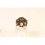 This is a Timed Online Auction on Bidspotter.co.uk, Click here to bid. A sapphire & gemstone ring