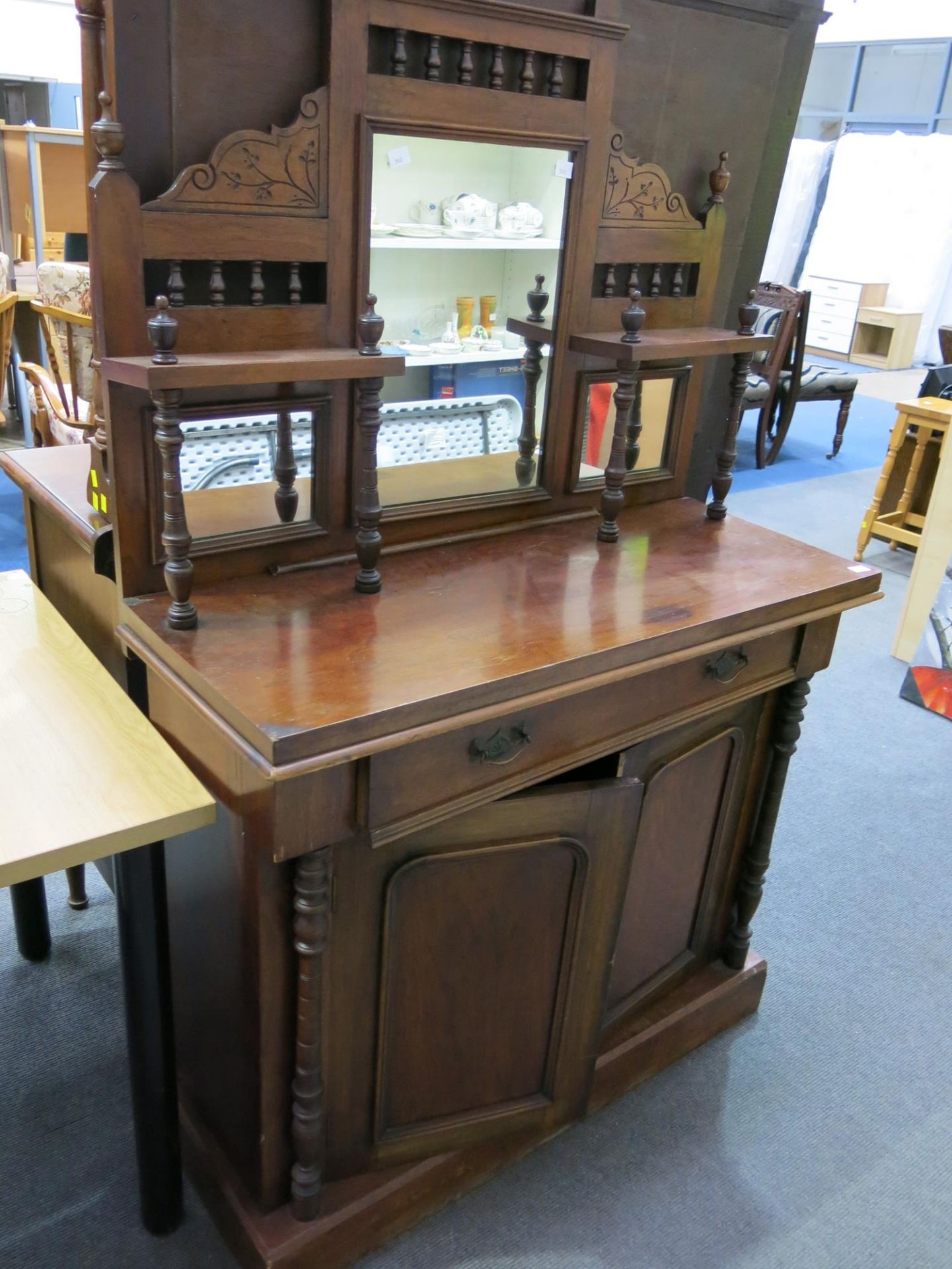 A chiffonier with three mirrored panels (H65cm, W105cm, D43cm) (est £100-£150)