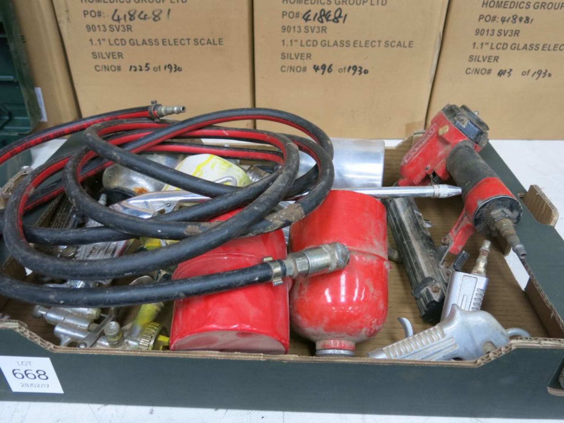 Various air tools and spray guns.