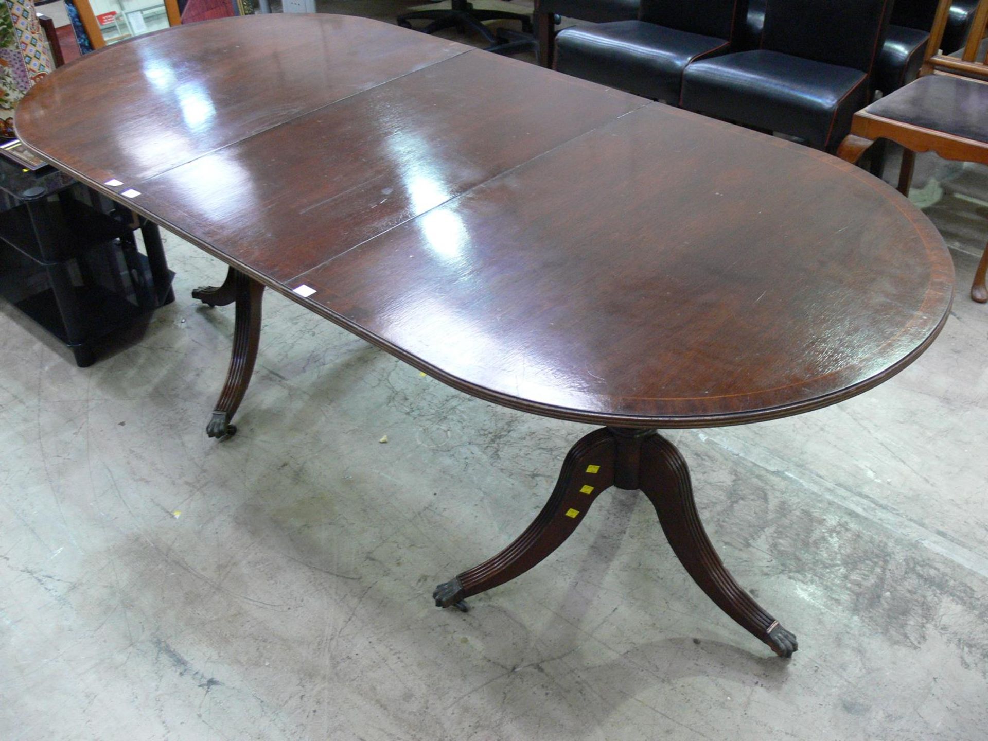 A double pedestal table with extra leaf (H87cm W97cm L (with leaf) 211cm, without 160cm (est £40-£