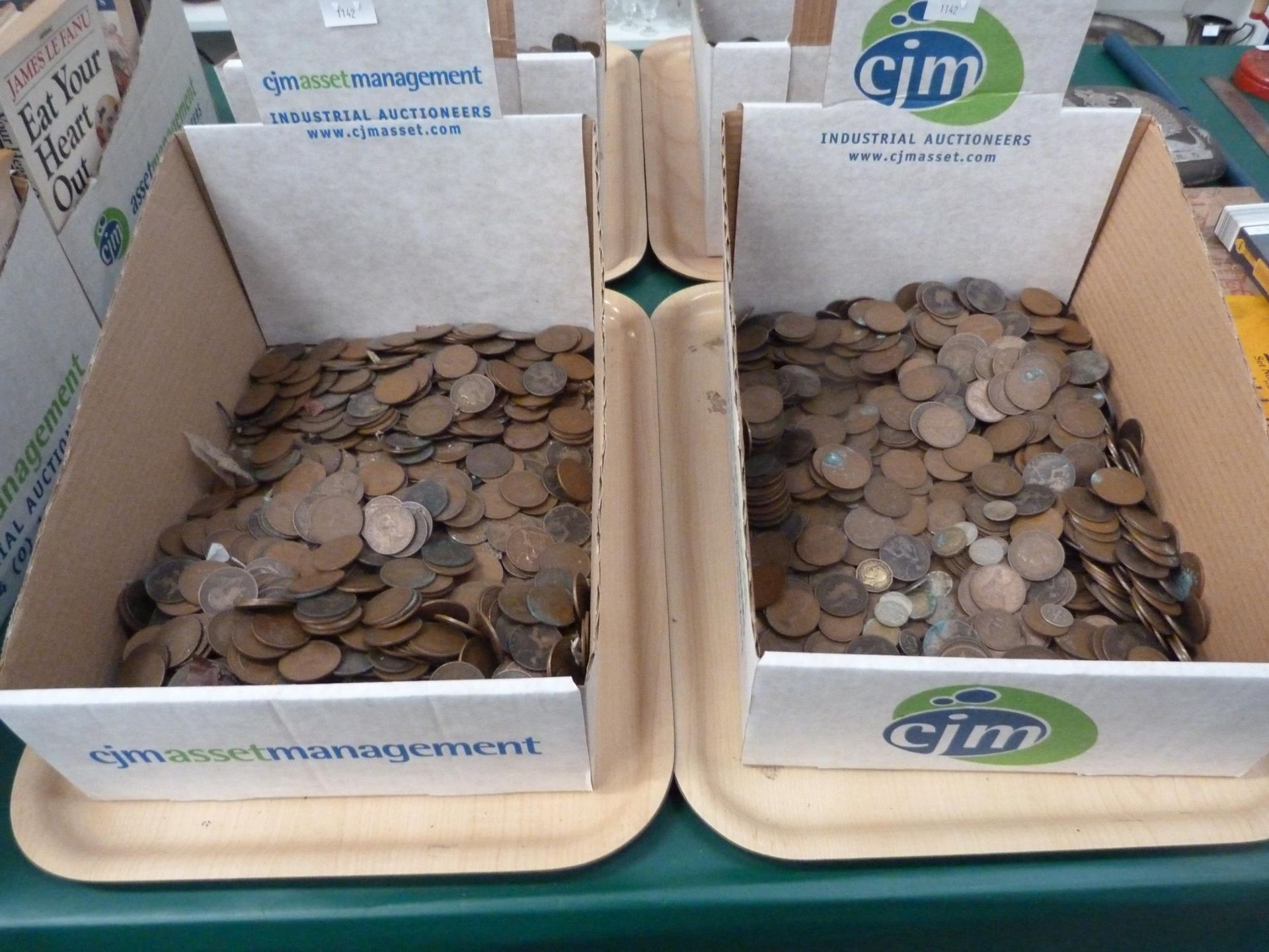 Four boxes of coins includes pennies, half pennies, 3d pieces etc (est £25-£50)