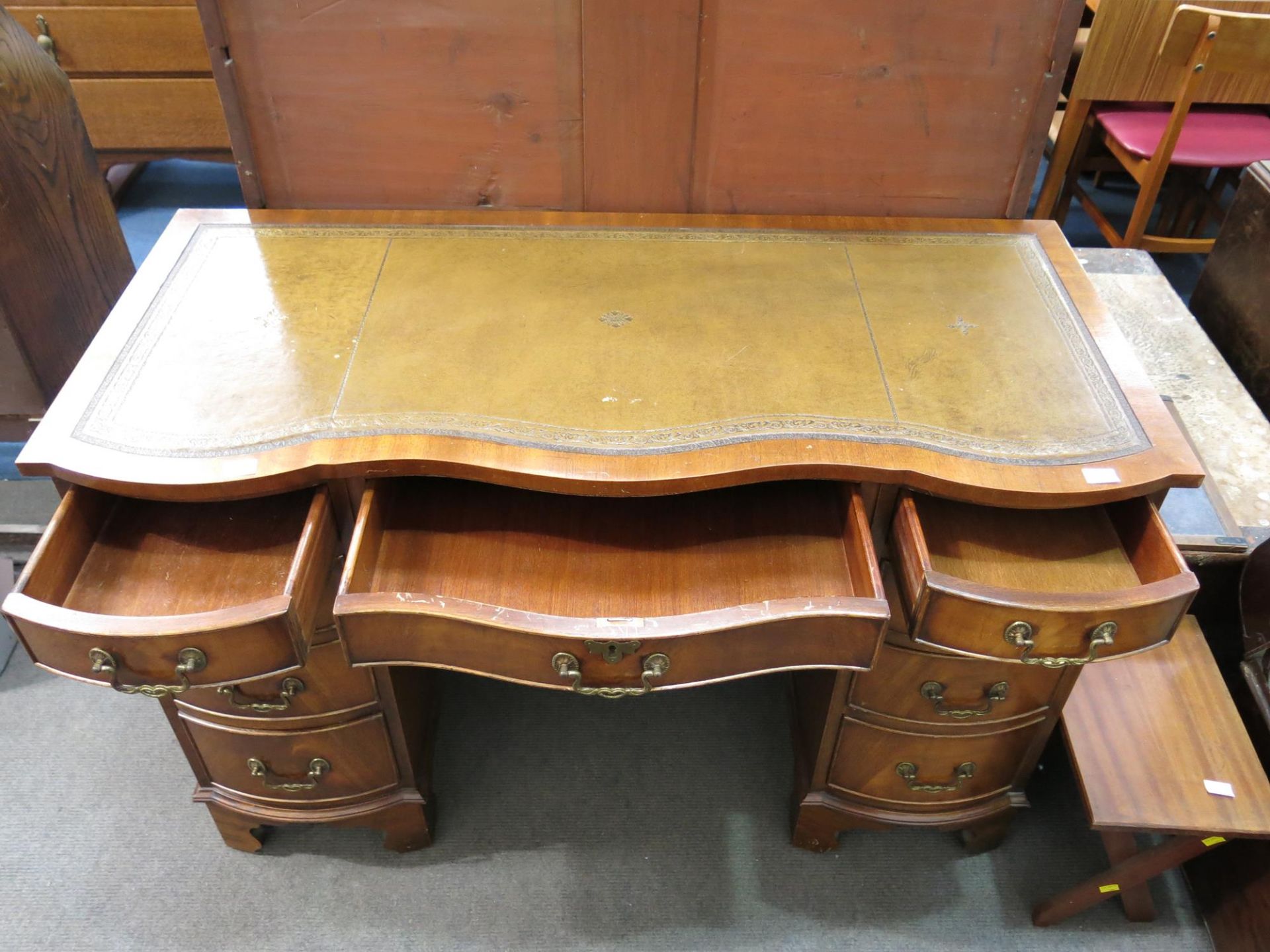 A pedestal desk with nine drawers and leather inlaid writing surface (H 76cm, W 115cm, D 52cm) ( - Image 3 of 3