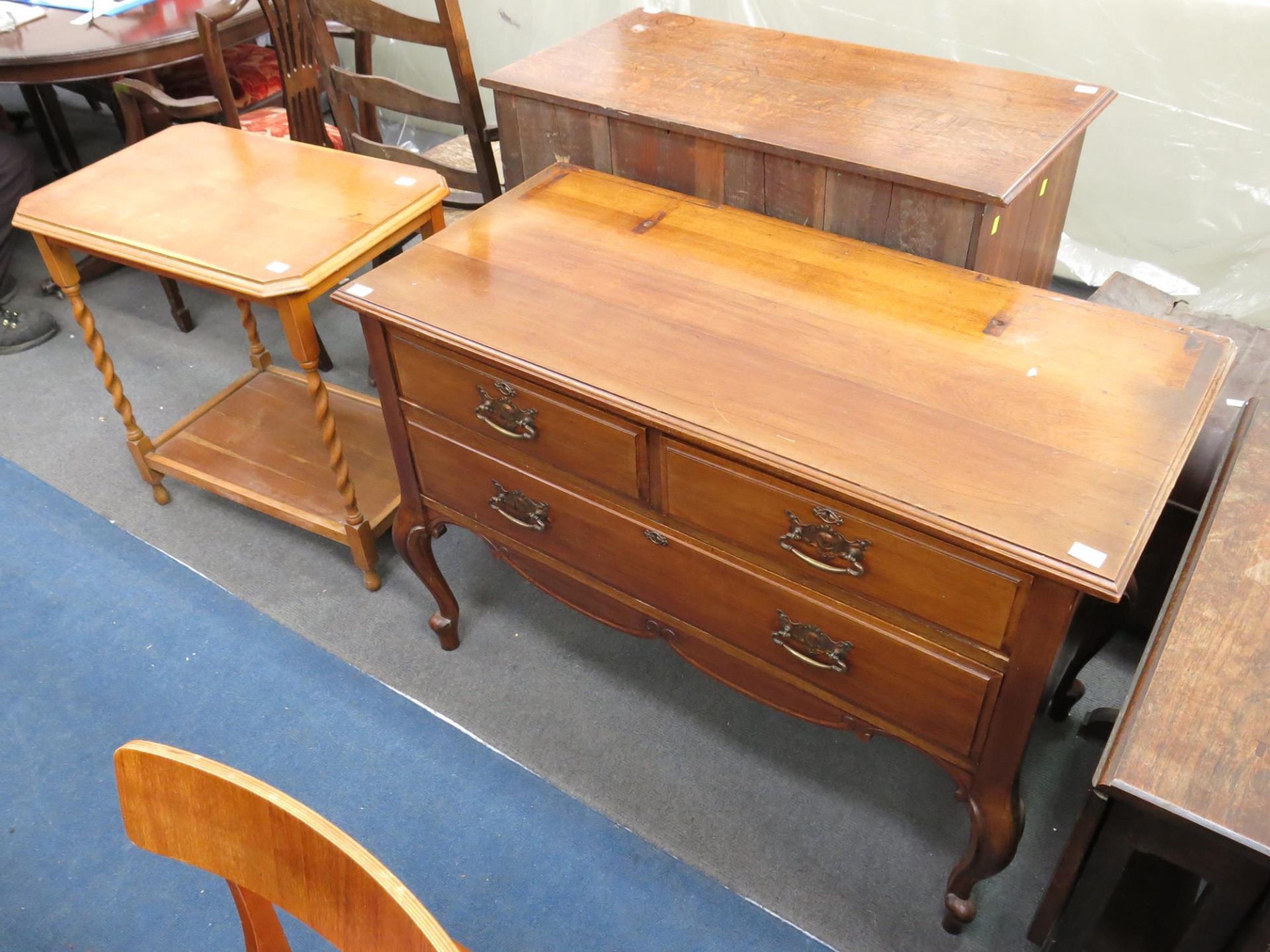 A three drawer dresser base with metal drop handles (Height- 74cm Width- 106cm Diameter- 51cm)