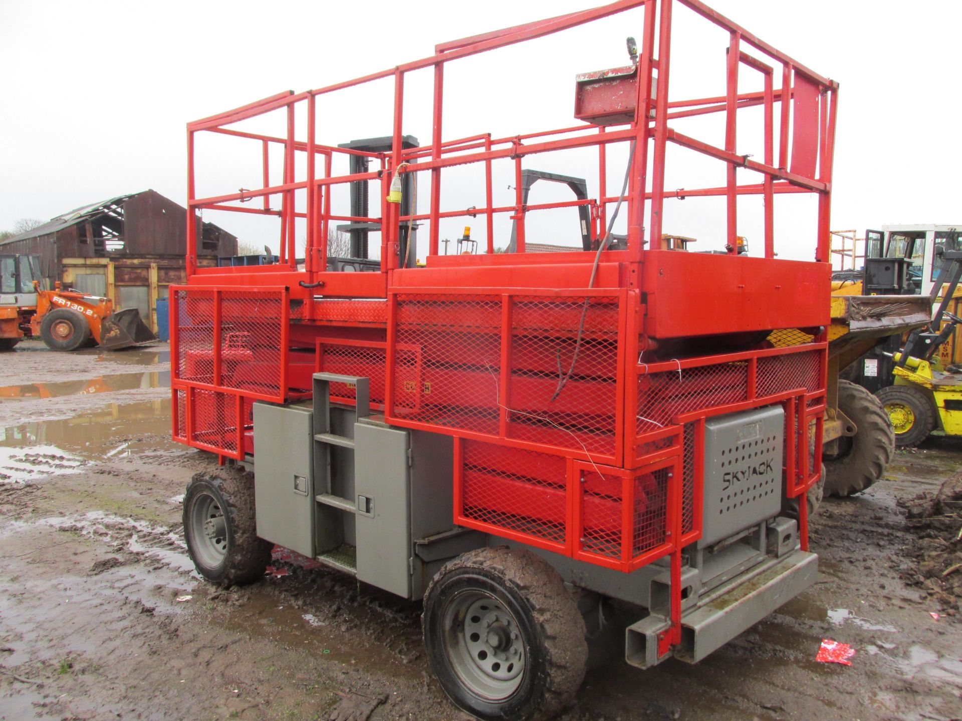 * Skyjack 8841 4x2 scissor lift, 1999, 2430 hours, Kubota engine, solid tyres, tested, runner.