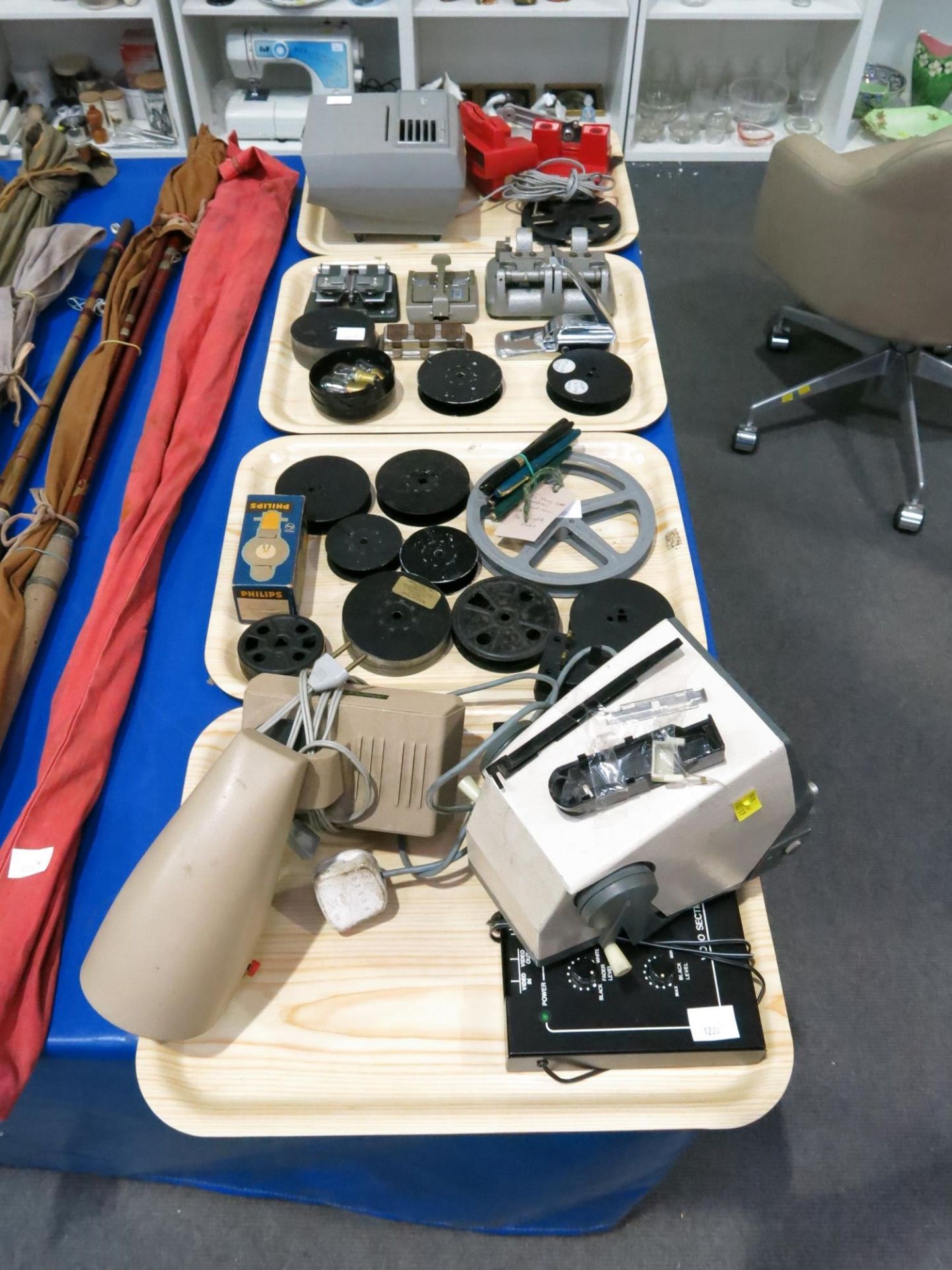 A selection of photography equipment which includes an AVC 100 video audio editing console, an